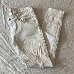 White ripped jeans